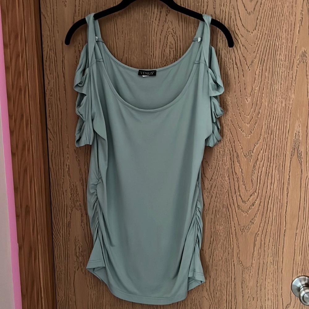 Very pale teal green top With beautiful cut outs on the arms.